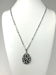 Teardrop pendant necklace with leaf design, sparkling accents, and scratch-resistant silver chain for timeless elegance.