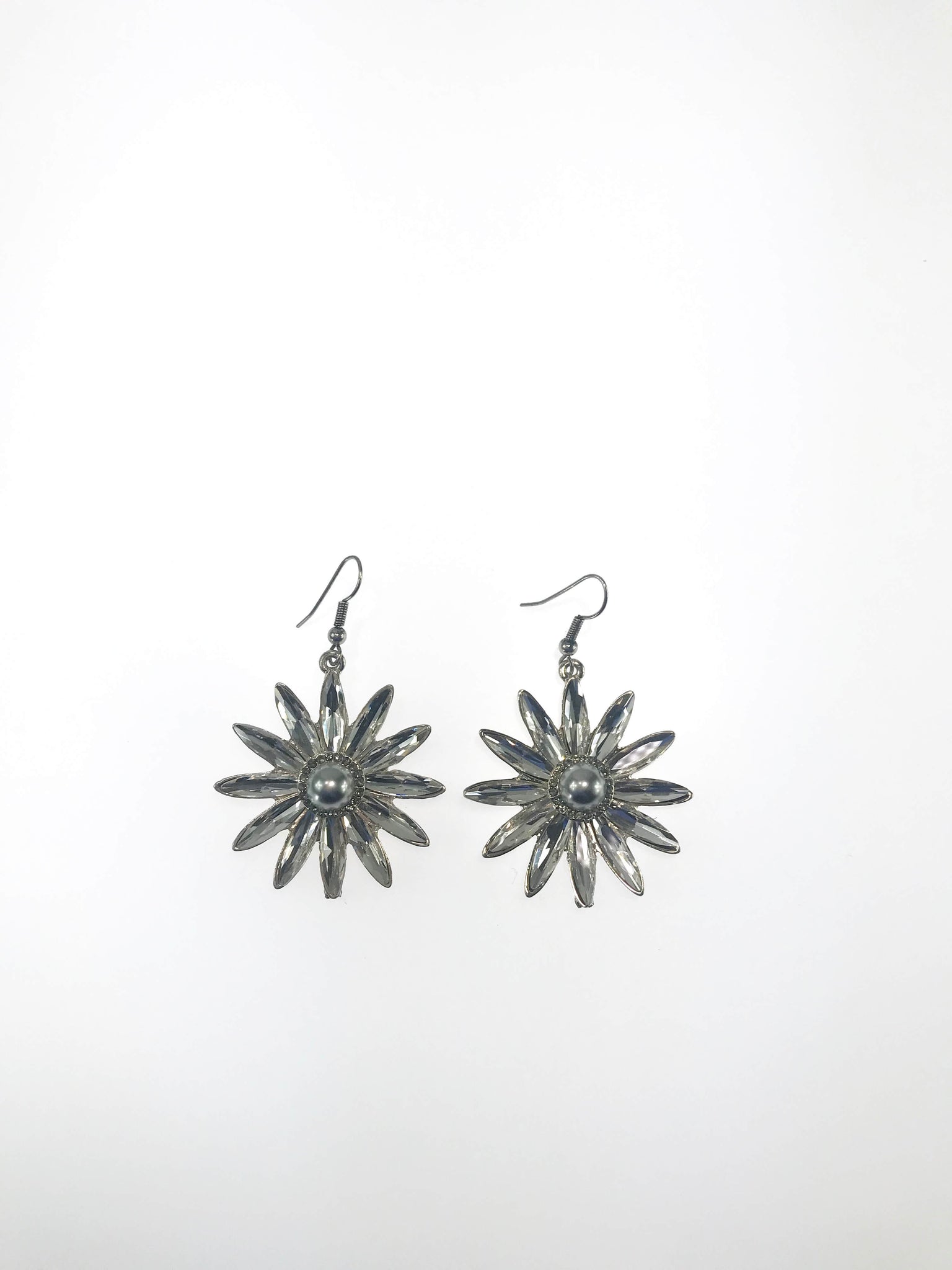 Silver Sunburst Earrings with a grey pearl center and radiant floral-inspired design, lightweight and elegant for any occasion.