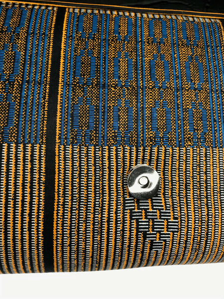 Handmade clutch with navy safari print, African-inspired design, and bold style for timeless elegance and fun.