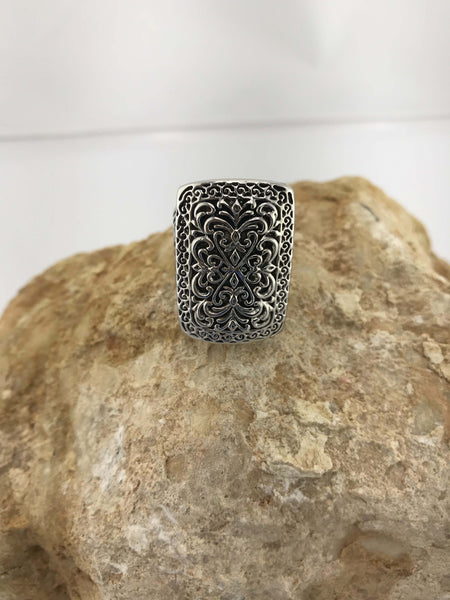 Handcrafted sterling silver ring with intricate filigree details and scratch-resistant vintage finish. Elegant, timeless statement piece for any occasion.