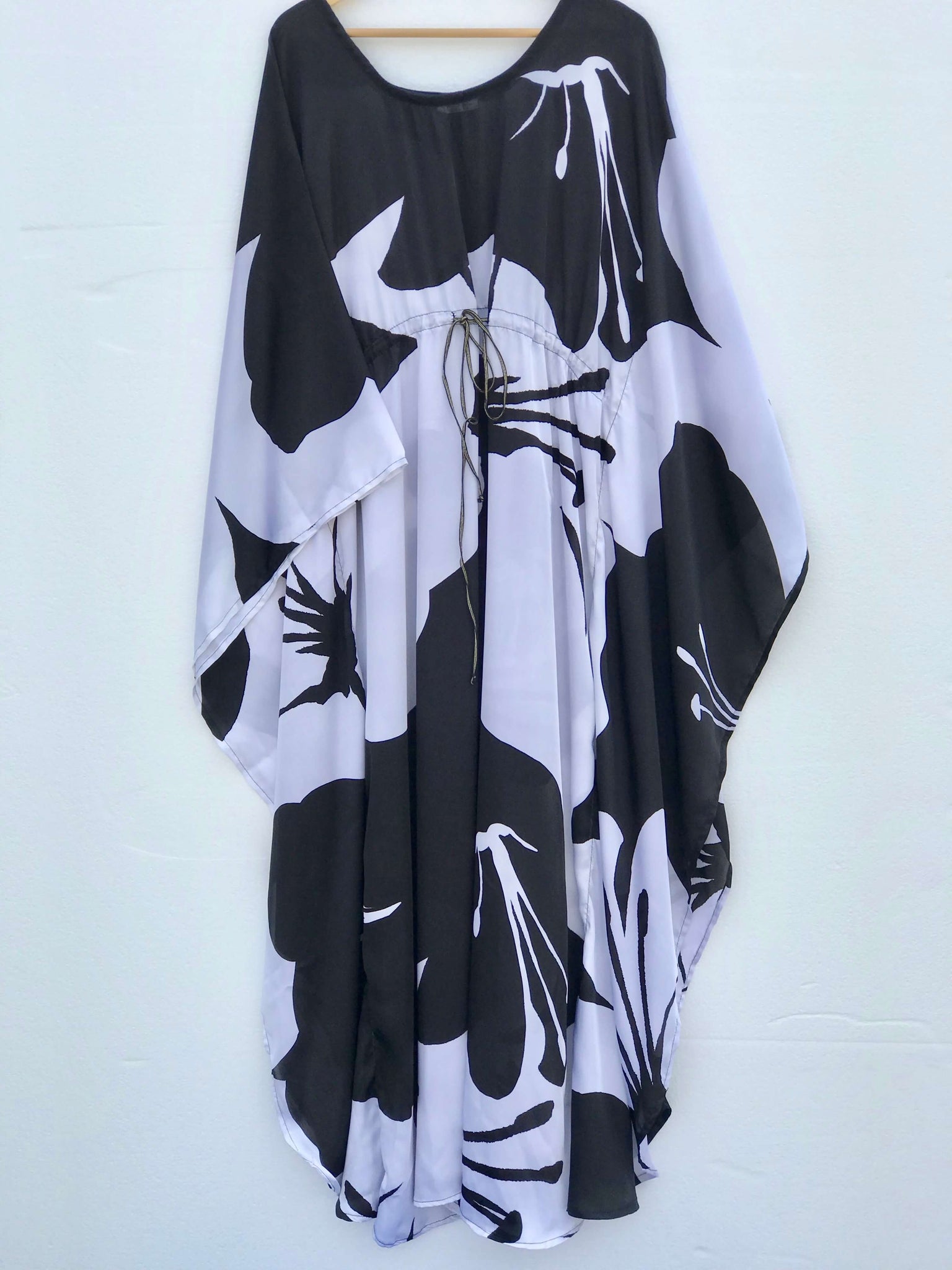Midnight Blossom Kaftan - Black and white satin with flower design and front string tie, elegant draping loungewear from TARU.