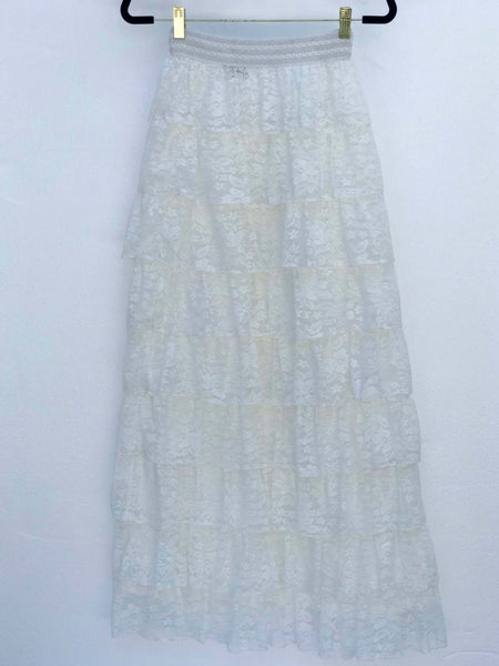 Ruffled Romance Maxi Skirt with tiered lace design in white, feminine silhouette for weddings and casual wear, sizes XS-L.