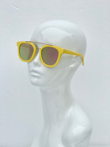 Yellow square sunglasses with tinted lenses and UV protection. Bold, vibrant, and perfect for festivals or casual outings.
