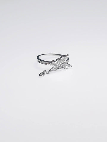 Butterfly Bliss Ring with butterfly design, crystal accents, and dangling charm. A stunning silver accessory for any jewelry lover.