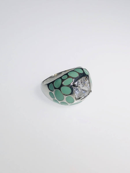 AquaLuxe Spark Ring featuring a square-cut crystal, seafoam green enamel, and silver-tone design. Elegant and modern statement jewelry.