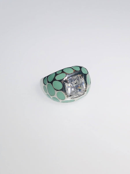 AquaLuxe Spark Ring featuring a square-cut crystal, seafoam green enamel, and silver-tone design. Elegant and modern statement jewelry.