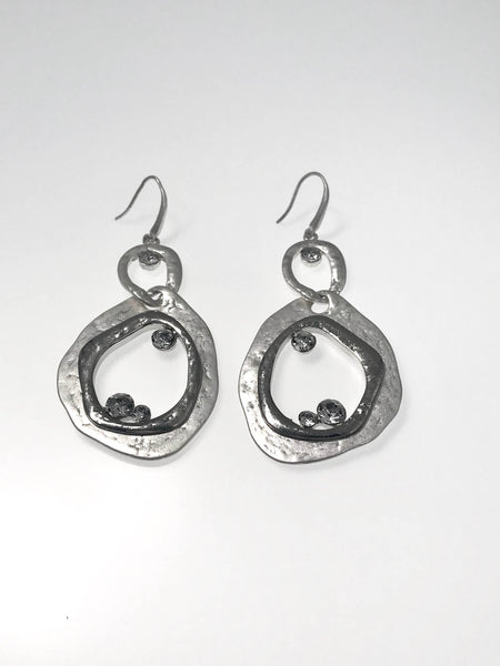 Sleek silver-tone dangle earrings with an open teardrop design, hammered texture, and sparkling rhinestones. Lightweight and perfect for day-to-night elegance.