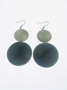 Bold double-disc dangle earrings with textured spiral patterns, gradient black and gold tones, and a cascading design. Lightweight, nickel-free, and 3 inches long with fishhook backings for comfort and secure wear