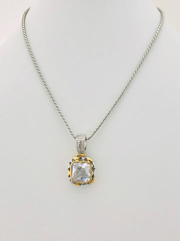 Eternal Spotlight Necklace featuring a radiant square-cut crystal in a gold-accented bezel with a silver-tone finish and twisted silver chain.