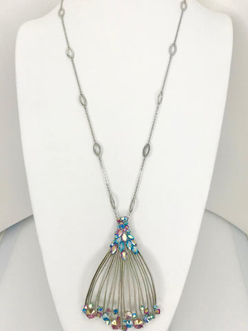 Twilight Cascade Necklace with silver-tone fan-shaped pendant and multicolor crystals for chic, versatile style.